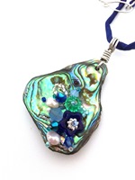 Embelllished Paua Pendant - Blues and pale Teals on deep blue silk string