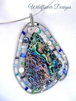 Wired Paua Pendant Embellished with blues and greens